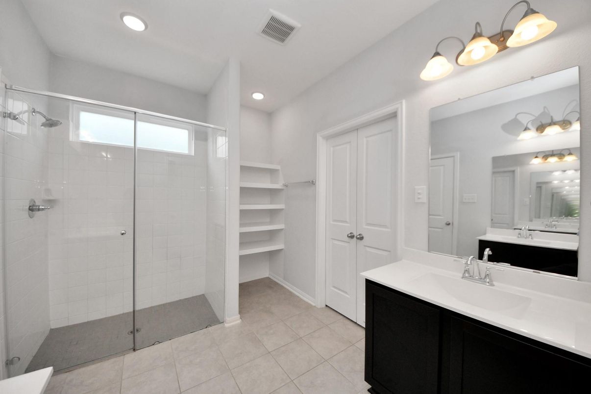 Bathroom, Dual Sink Vanities, Glass Shower, Interior, Recessed Lighting, Walk-in Closets