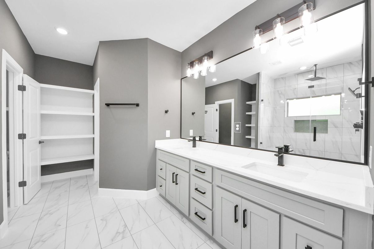 Bathroom, Dual Sink Vanities, Glass Shower, Interior, Marble, Marble Walls, Recessed Lighting