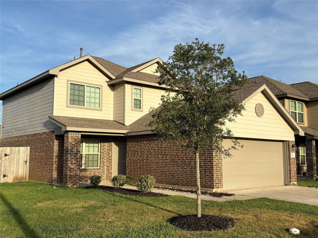 Attached, Exterior, Facade, Brick Facade, Brick Traditional