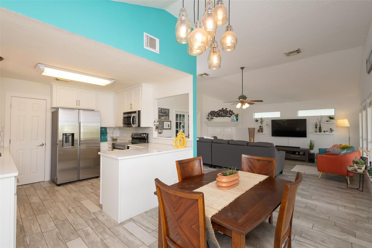 Dining room, Interior, Kitchen, Living room, Pendant Lights, Stainless Steel Appliances, Wood Texture Flooring