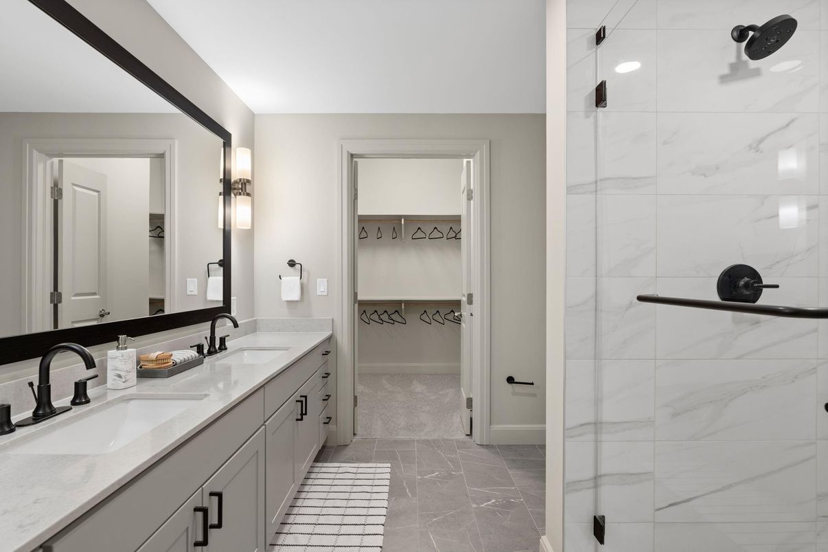 Bathroom, Dual Sink Vanities, Glass Shower, Interior, Marble, Marble Walls, Recessed Lighting, Walk-in Closets