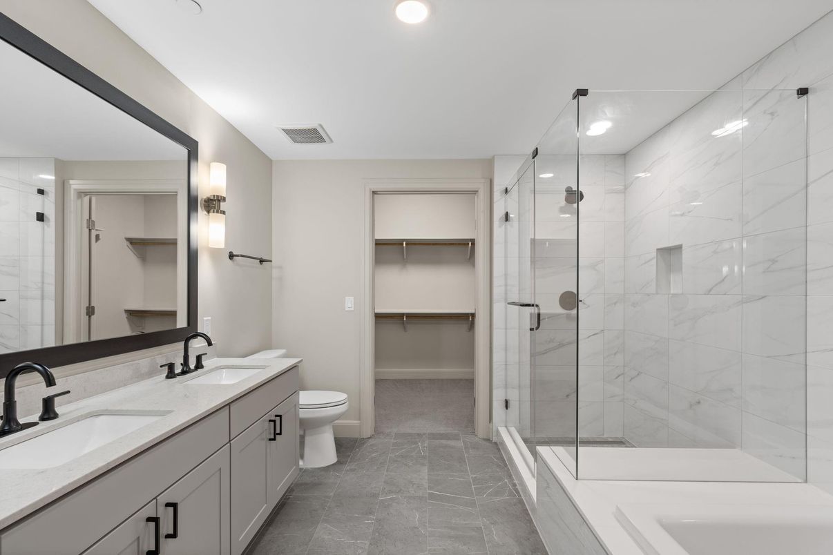 Bathroom, Dual Sink Vanities, Glass Shower, Interior, Marble Walls, Recessed Lighting