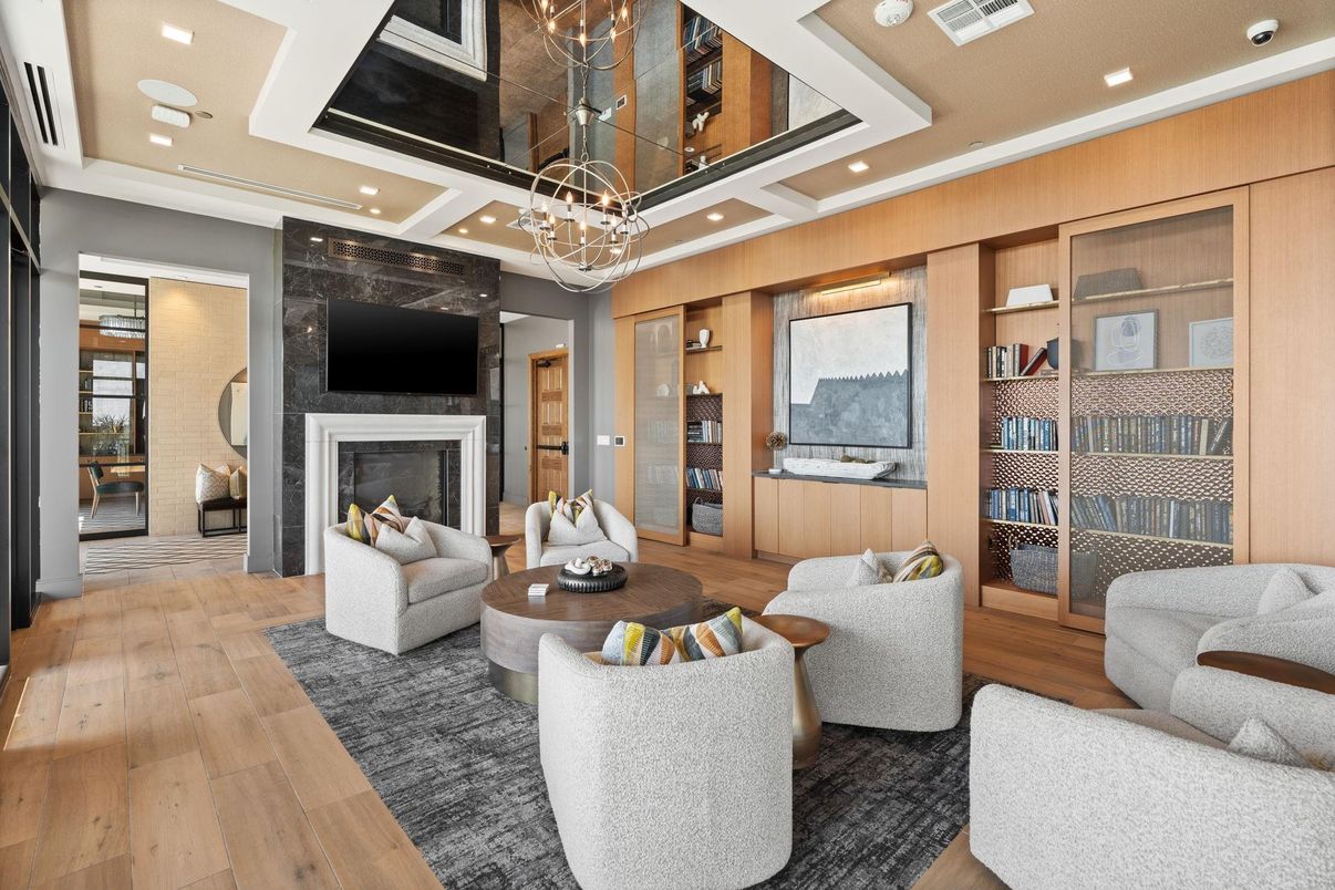Chandelier, Fireplace, Interior, Living room, Pendant Lights, Recessed Lighting, Wood Texture Flooring, Wooden Walls