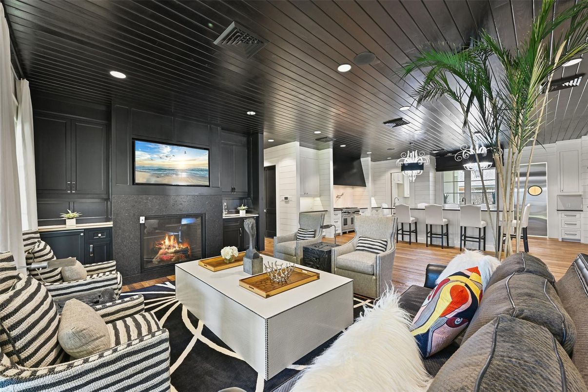 Dining room, Fireplace, Interior, Kitchen, Living room, Pendant Lights, Recessed Lighting, Wooden Ceilings, Wood Texture Flooring