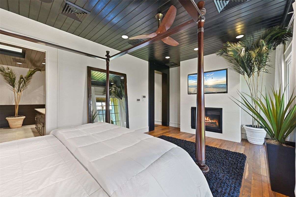 Bedroom, Fireplace, Interior, Recessed Lighting, Wood Texture Flooring