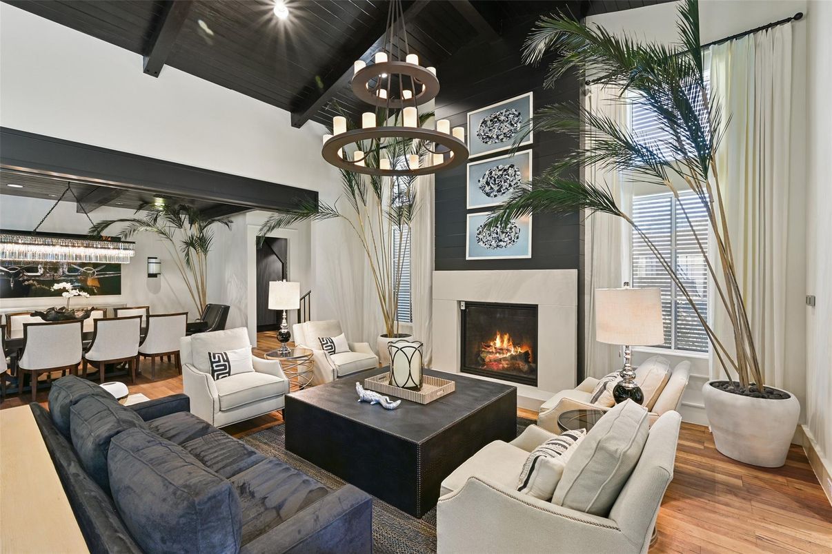 Chandelier, Dining room, Fireplace, Interior, Living room, Pendant Lights, Wooden Ceilings, Wood Texture Flooring