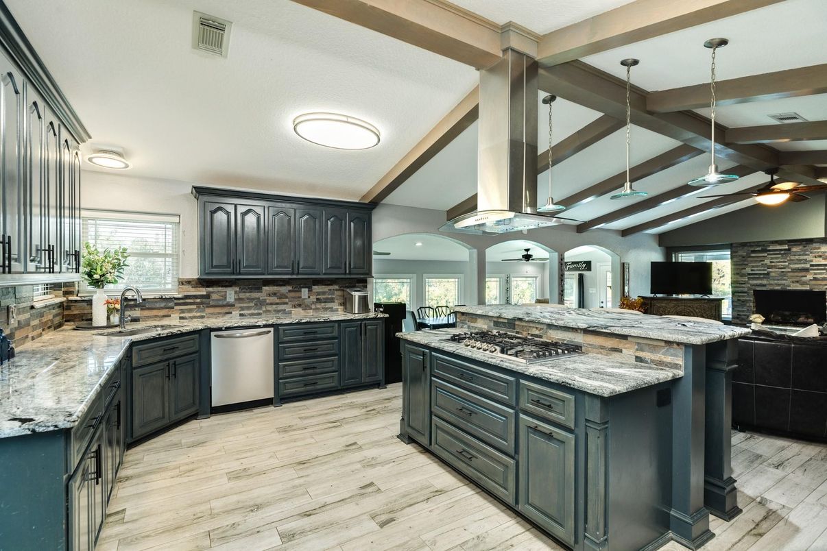 Interior, Kitchen, Pendant Lights, Stainless Steel Appliances, Stone Walls, Wood Texture Flooring