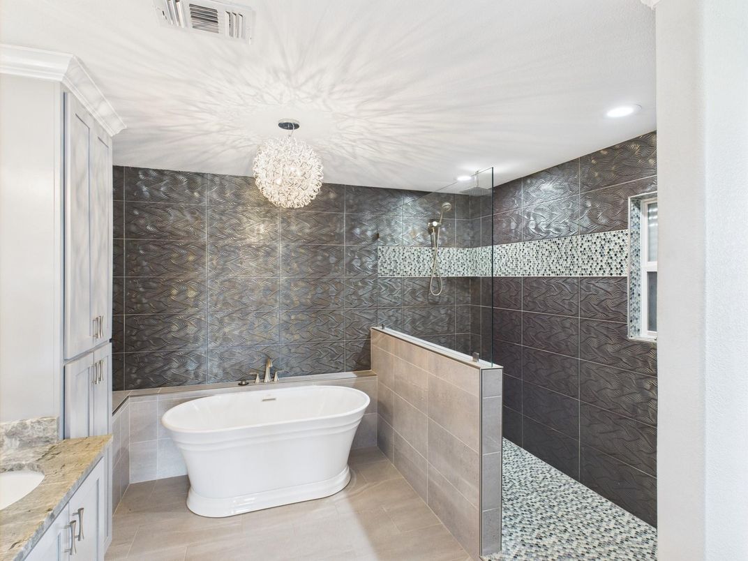 Bathroom, Chandelier, Free Standing Baths, Glass Shower, Interior, Marble Walls, Recessed Lighting