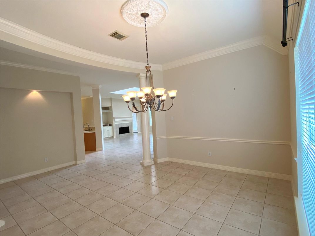 Chandelier, Empty room, Fireplace, Interior