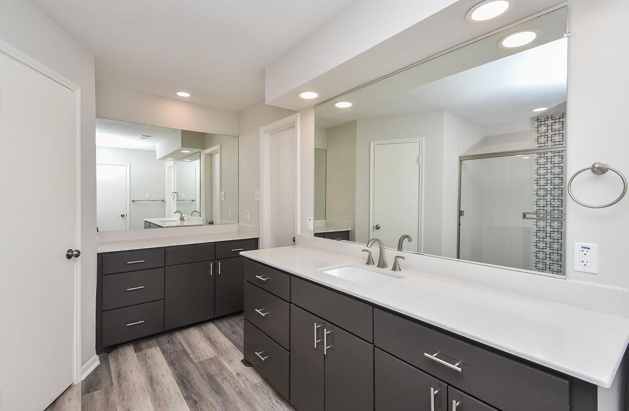 Bathroom, Dual Sink Vanities, Glass Shower, Interior, Recessed Lighting, Wood Texture Flooring