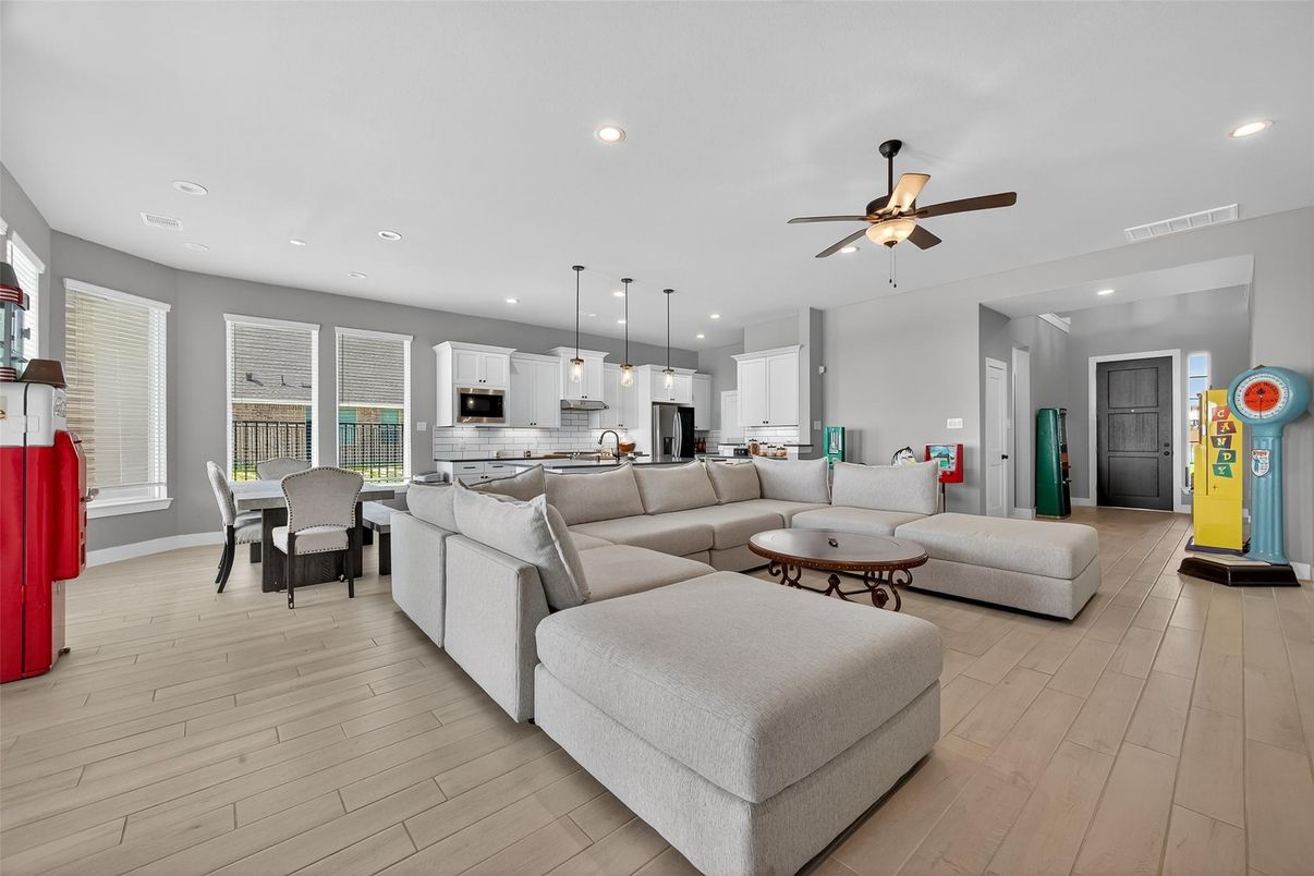 Dining room, Interior, Kitchen, Living room, Pendant Lights, Recessed Lighting, Stainless Steel Appliances, Wood Texture Flooring