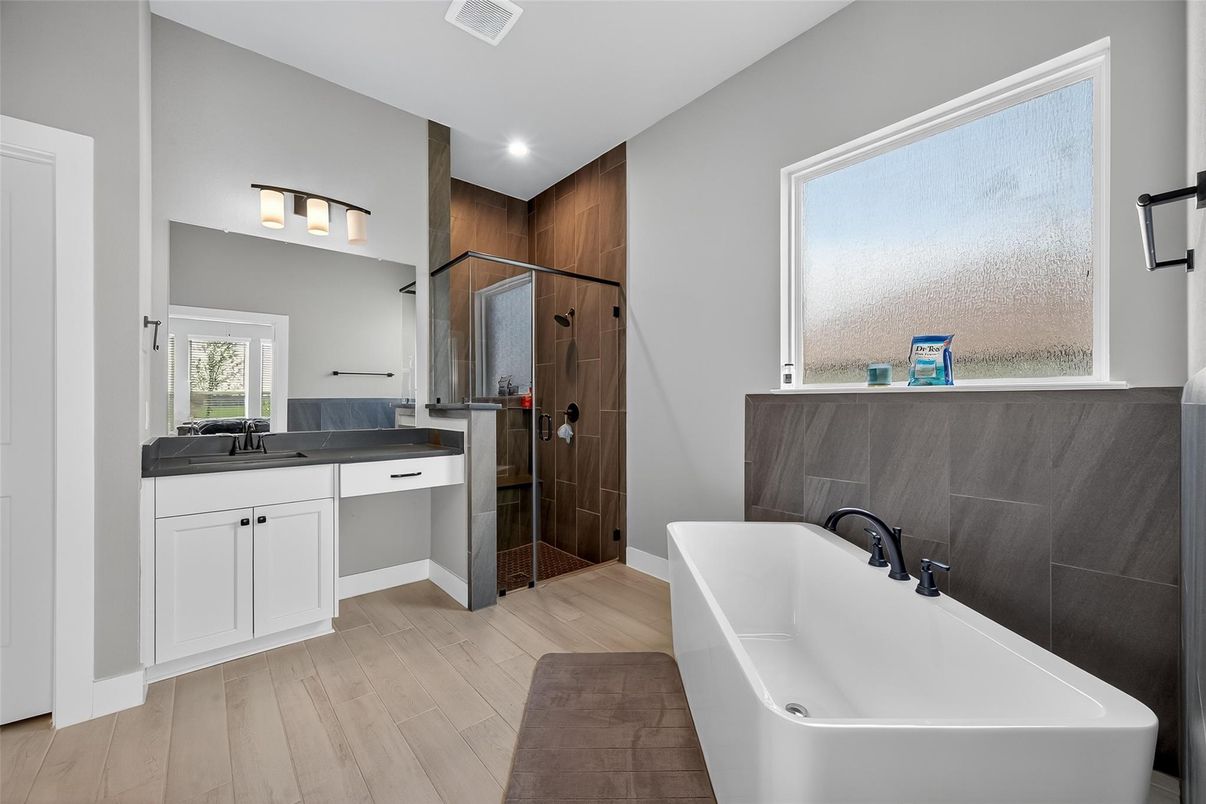 Bathroom, Dual Sink Vanities, Free Standing Baths, Interior, Recessed Lighting, Wood Texture Flooring