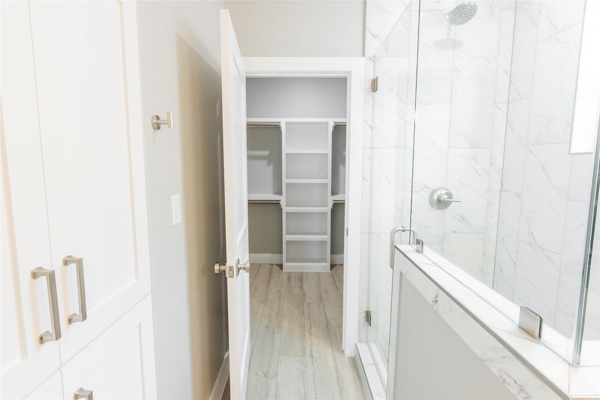 Bathroom, Glass Shower, Interior, Marble Walls, Walk-in Closets, Wood Texture Flooring