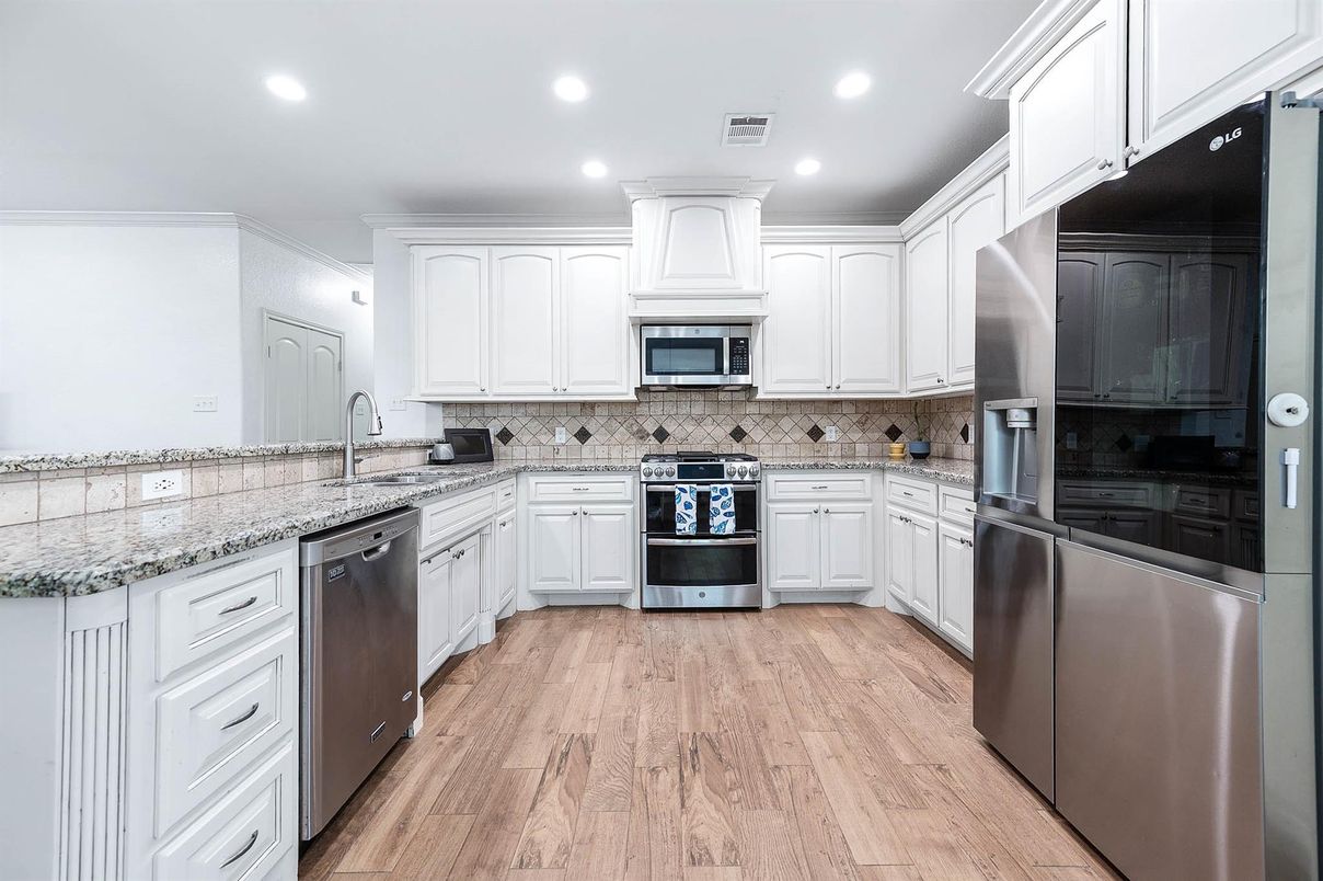 Interior, Kitchen, Recessed Lighting, Stainless Steel Appliances, Wood Texture Flooring