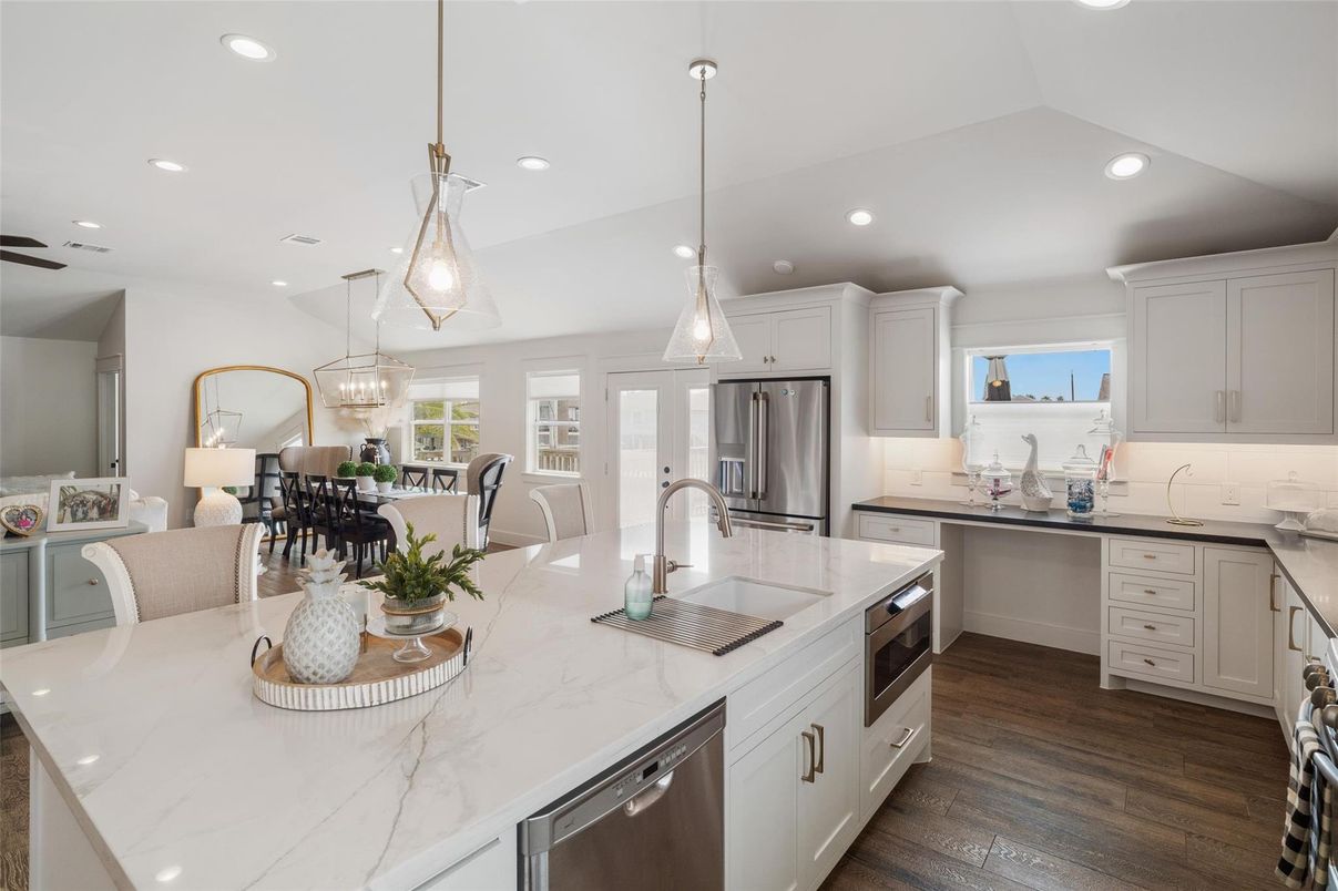 Dining room, Interior, Kitchen, Pendant Lights, Recessed Lighting, Stainless Steel Appliances, Wood Texture Flooring