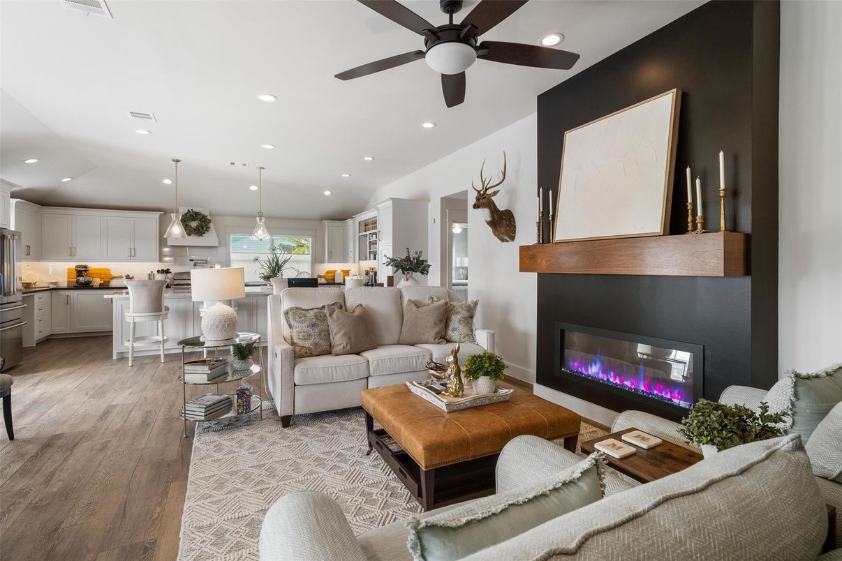 Fireplace, Interior, Kitchen, Living room, Pendant Lights, Recessed Lighting, Stainless Steel Appliances, Wood Texture Flooring