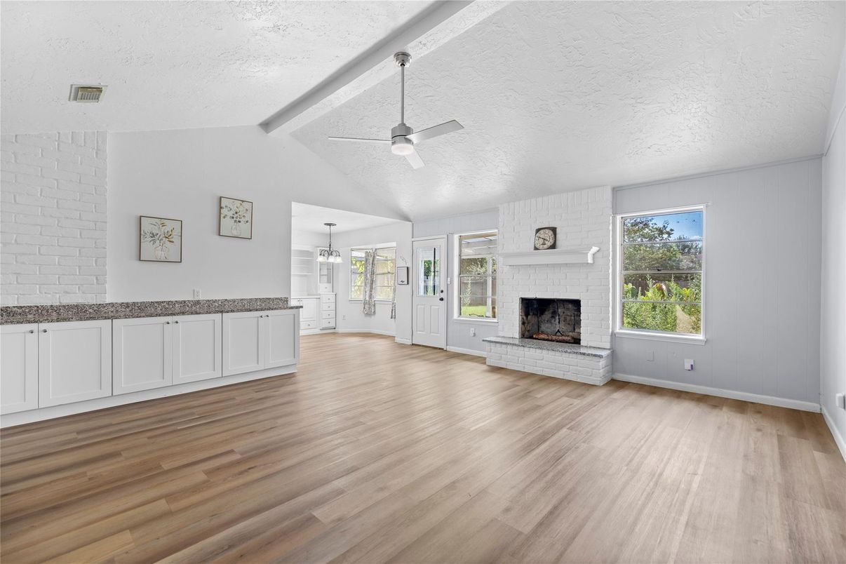 Empty room, Fireplace, Interior, Pendant Lights, Wood Texture Flooring