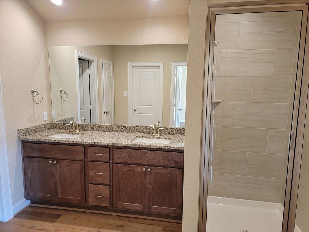 Bathroom, Dual Sink Vanities, Interior, Recessed Lighting, Wood Texture Flooring