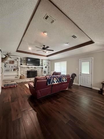 Fireplace, Interior, Living room, Recessed Lighting, Stone Walls, Wood Texture Flooring