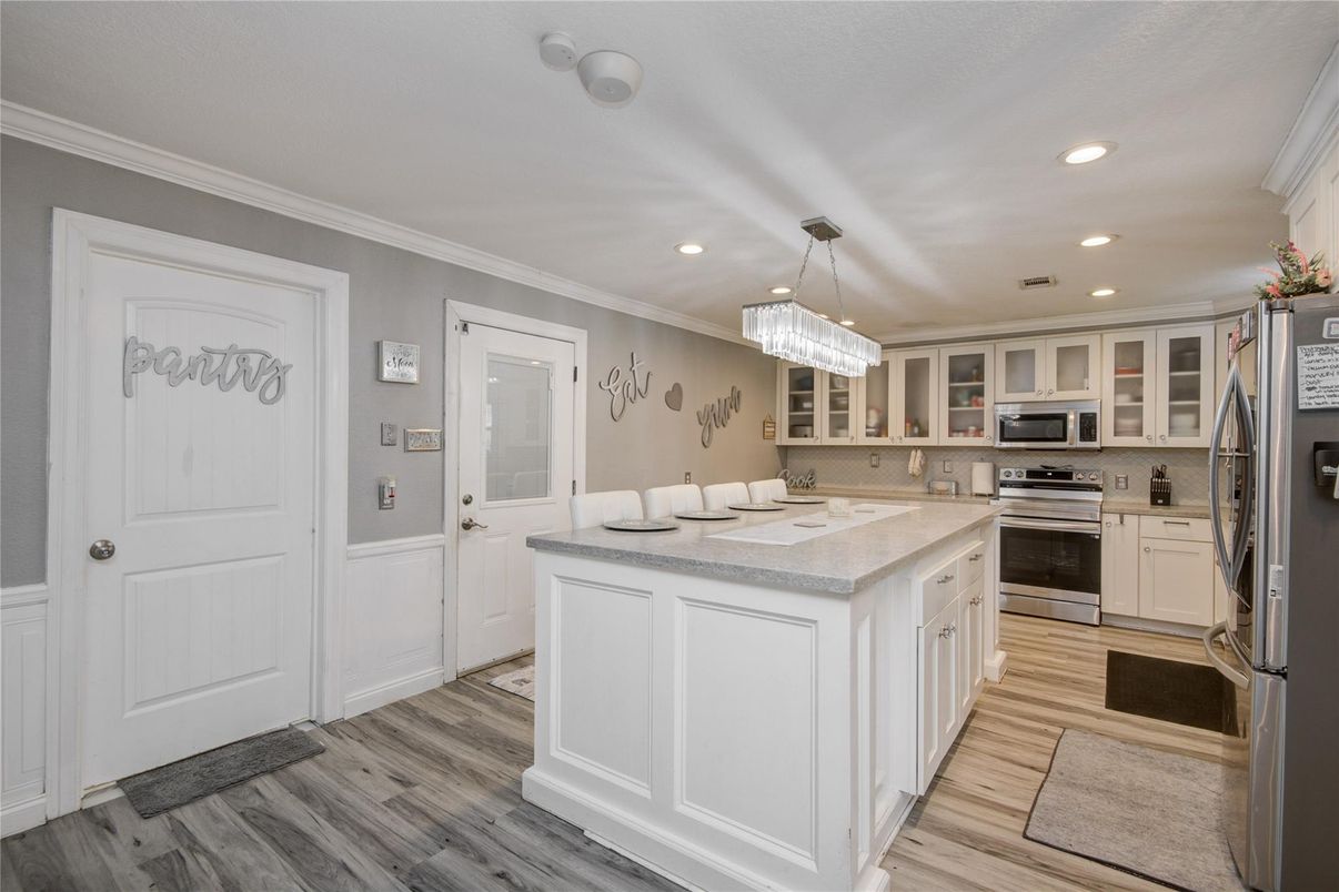 Chandelier, Interior, Kitchen, Pendant Lights, Recessed Lighting, Stainless Steel Appliances, Wood Texture Flooring