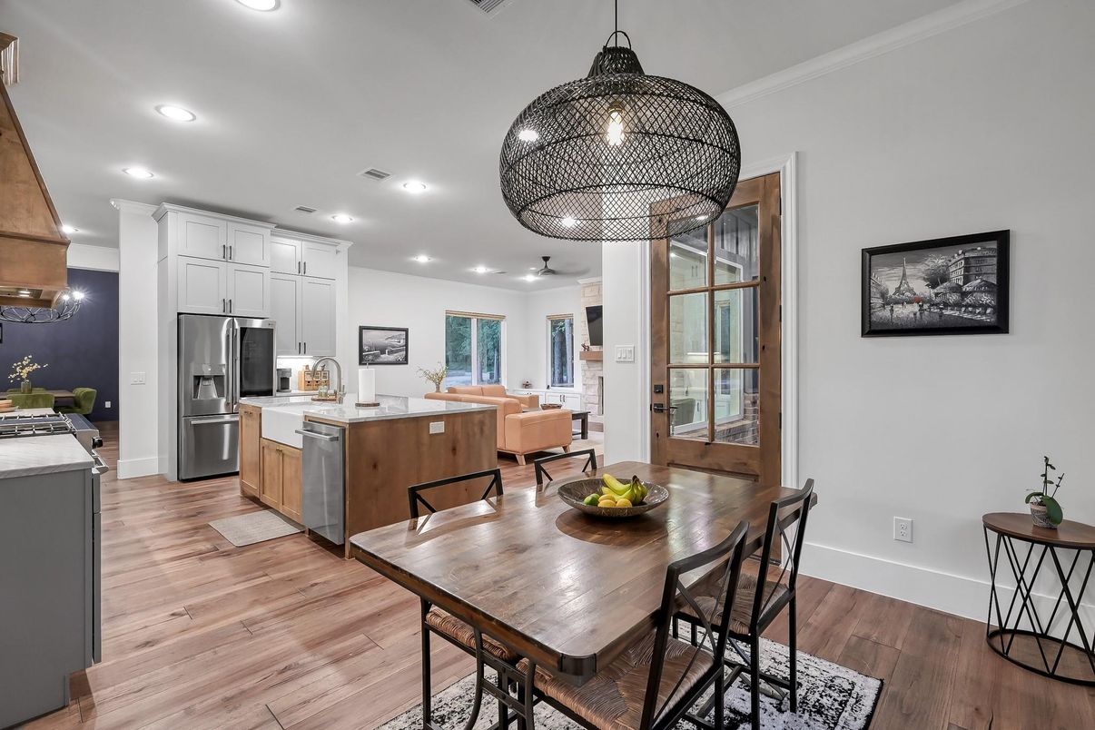 Dining room, Interior, Kitchen, Pendant Lights, Recessed Lighting, Stainless Steel Appliances, Wood Texture Flooring