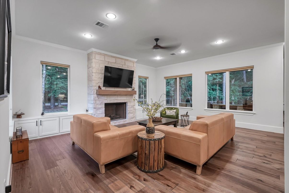 Fireplace, Interior, Living room, Recessed Lighting, Stone Walls, Wood Texture Flooring