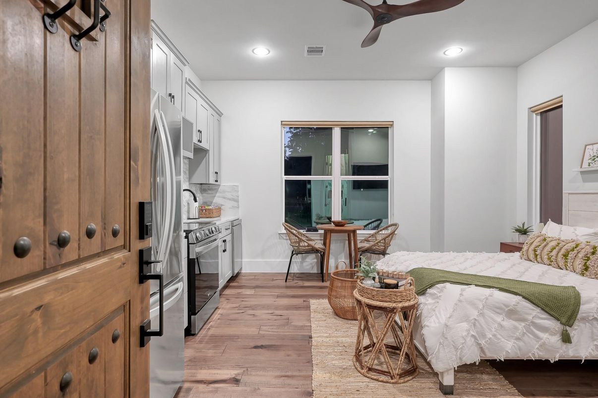 Bedroom, Dining room, Interior, Kitchen, Recessed Lighting, Stainless Steel Appliances, Wood Texture Flooring