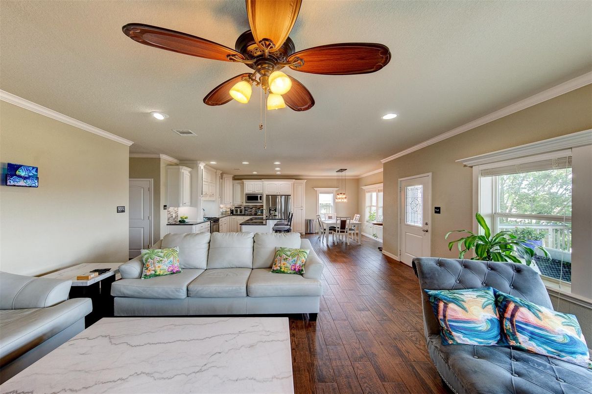 Dining room, Interior, Kitchen, Living room, Pendant Lights, Recessed Lighting, Stainless Steel Appliances, Wood Texture Flooring