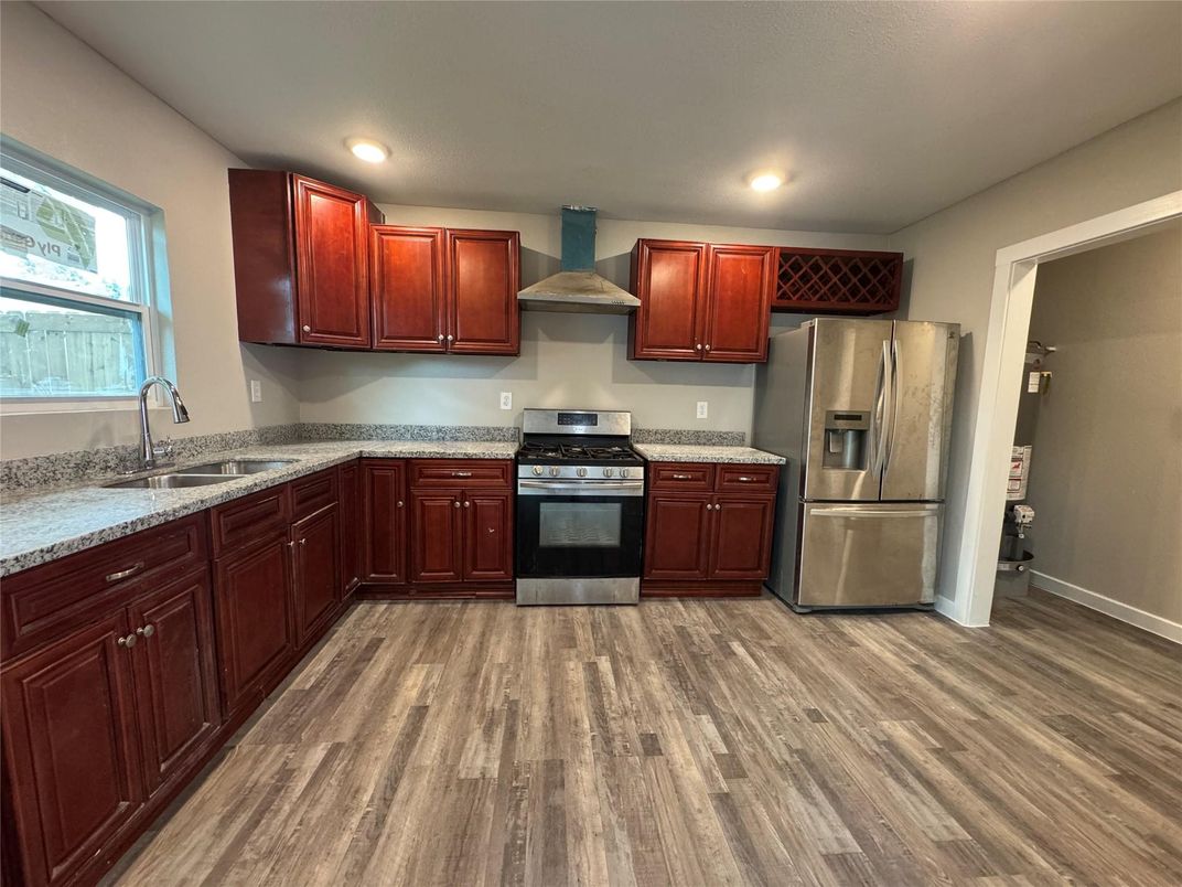 Interior, Kitchen, Recessed Lighting, Stainless Steel Appliances, Wood Texture Flooring