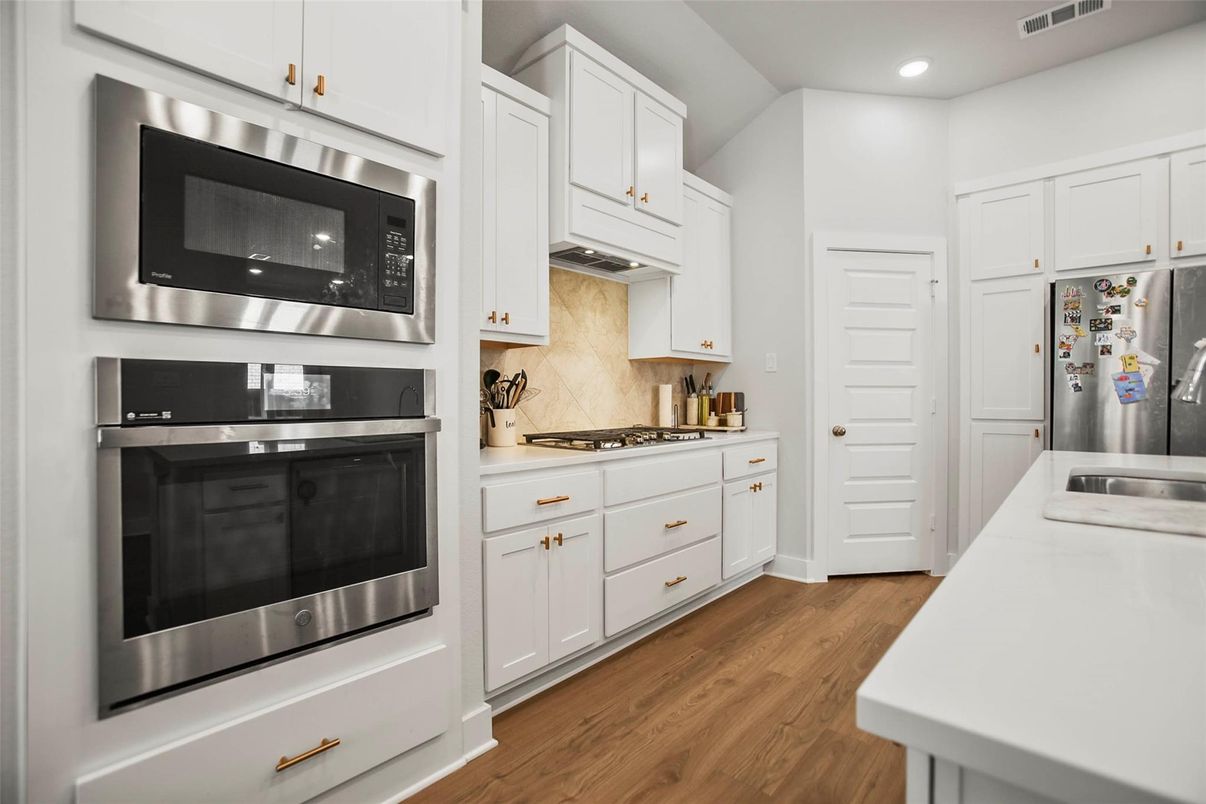 Interior, Kitchen, Recessed Lighting, Stainless Steel Appliances, Wood Texture Flooring