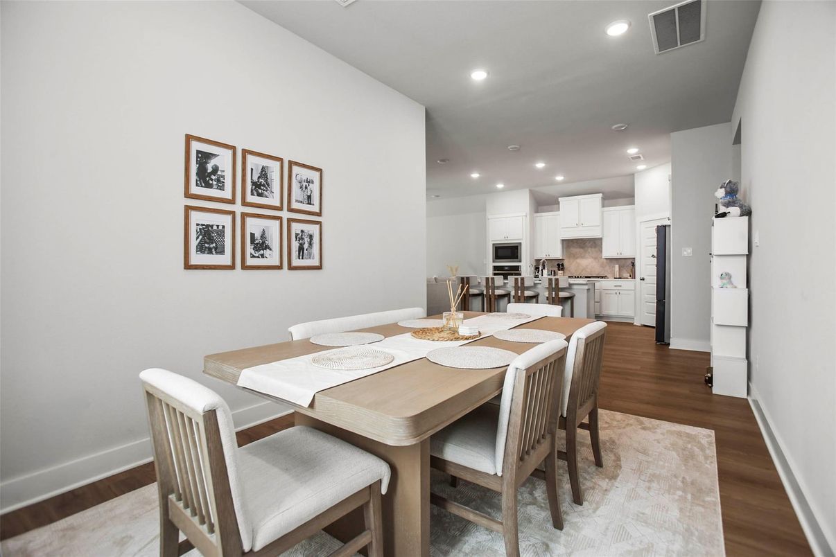 Dining room, Interior, Kitchen, Recessed Lighting, Stainless Steel Appliances, Wood Texture Flooring