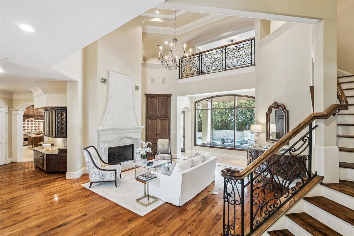 Chandelier, Fireplace, Interior, Living room, Recessed Lighting, Wood Texture Flooring