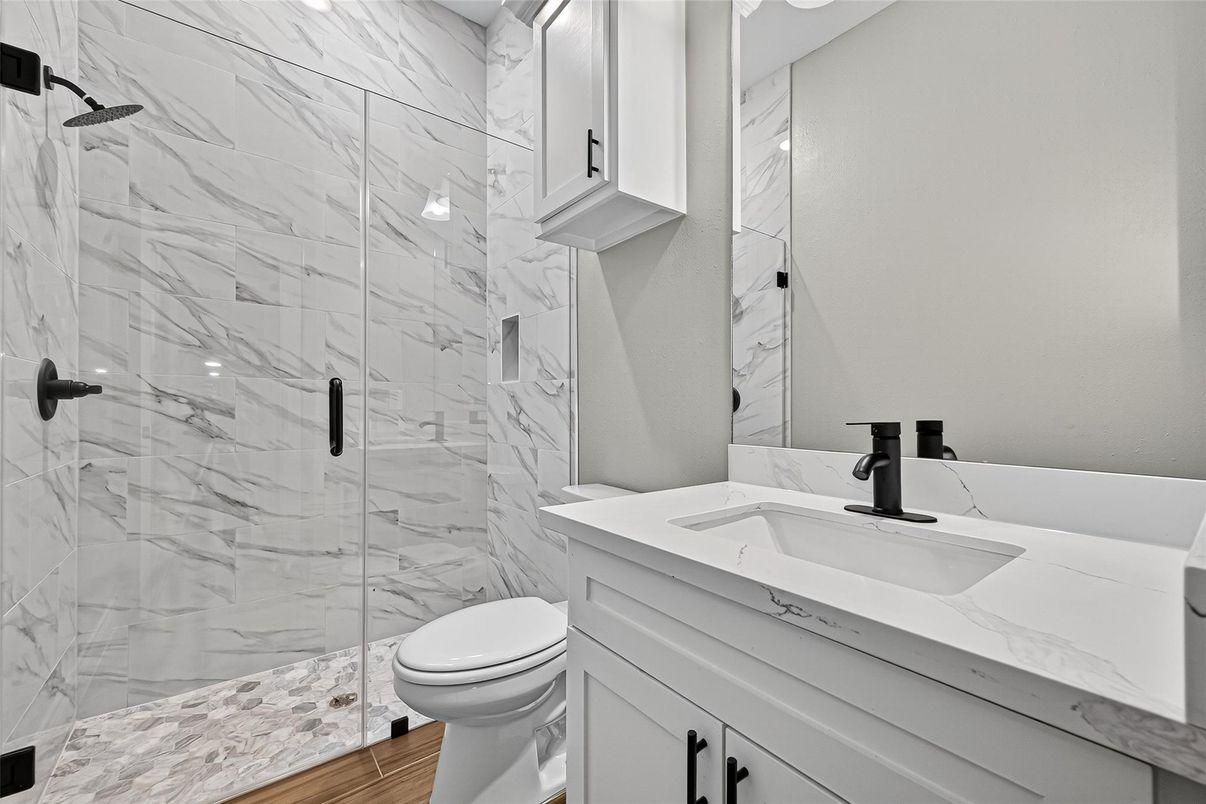 Bathroom, Glass Shower, Interior, Marble Walls, Wood Texture Flooring