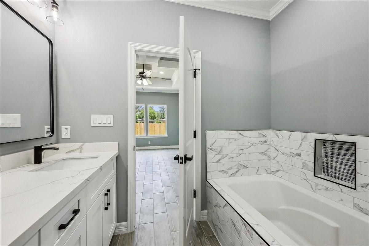 Bathroom, Dual Sink Vanities, Interior, Marble Walls, Wood Texture Flooring