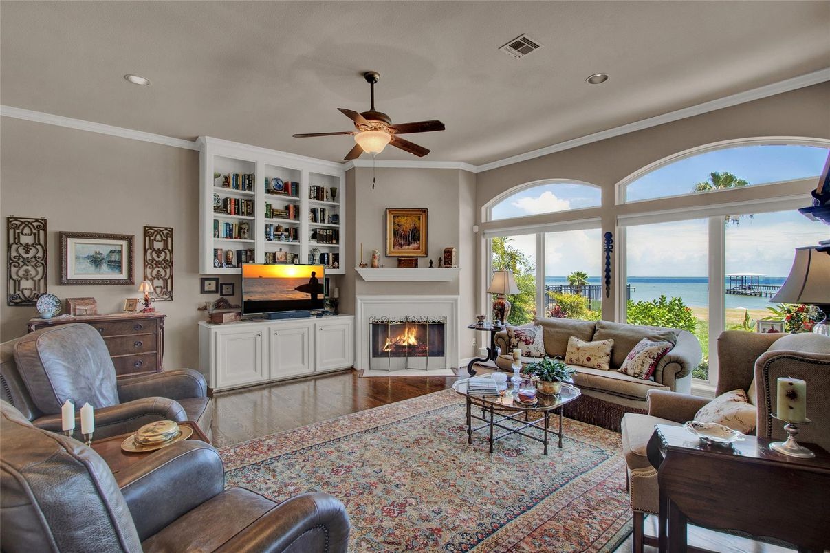 Fireplace, Interior, Living room, Recessed Lighting, Water, Wood Texture Flooring