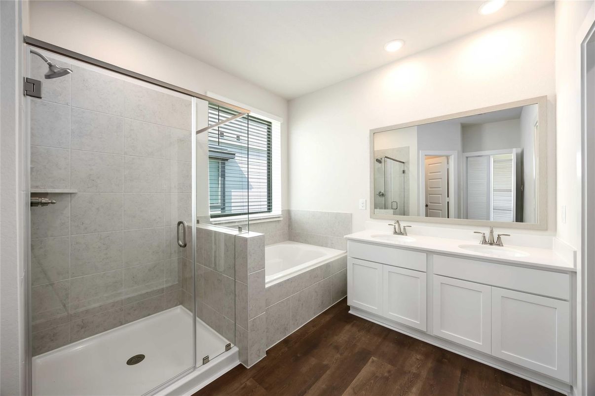 Bathroom, Dual Sink Vanities, Glass Shower, Interior, Recessed Lighting, Wood Texture Flooring