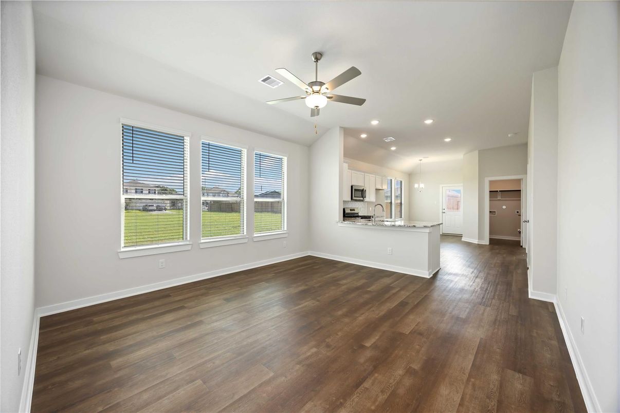 Empty room, Interior, Kitchen, Pendant Lights, Recessed Lighting, Stainless Steel Appliances, Wood Texture Flooring