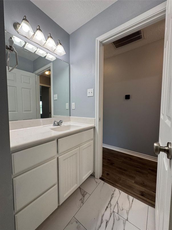Bathroom, Dual Sink Vanities, Interior, Marble, Wood Texture Flooring