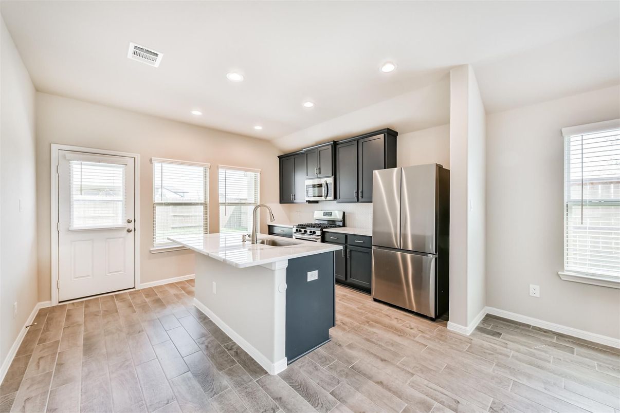 Interior, Kitchen, Recessed Lighting, Stainless Steel Appliances, Wood Texture Flooring