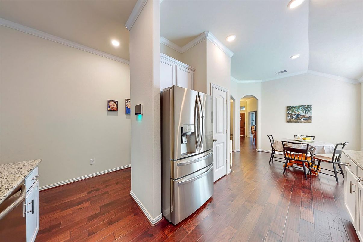 Dining room, Interior, Kitchen, Recessed Lighting, Stainless Steel Appliances, Wood Texture Flooring