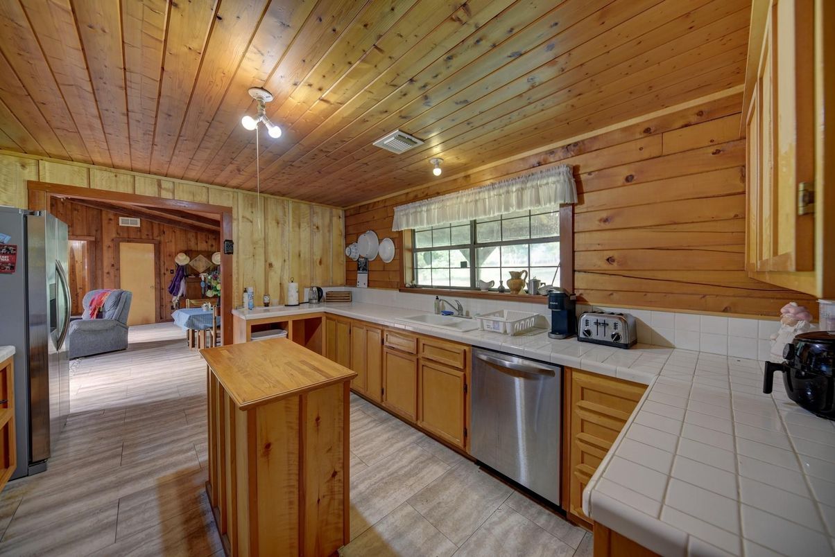 Interior, Kitchen, Tile Countertops, Wooden Ceilings, Wood Texture Flooring, Wooden Walls