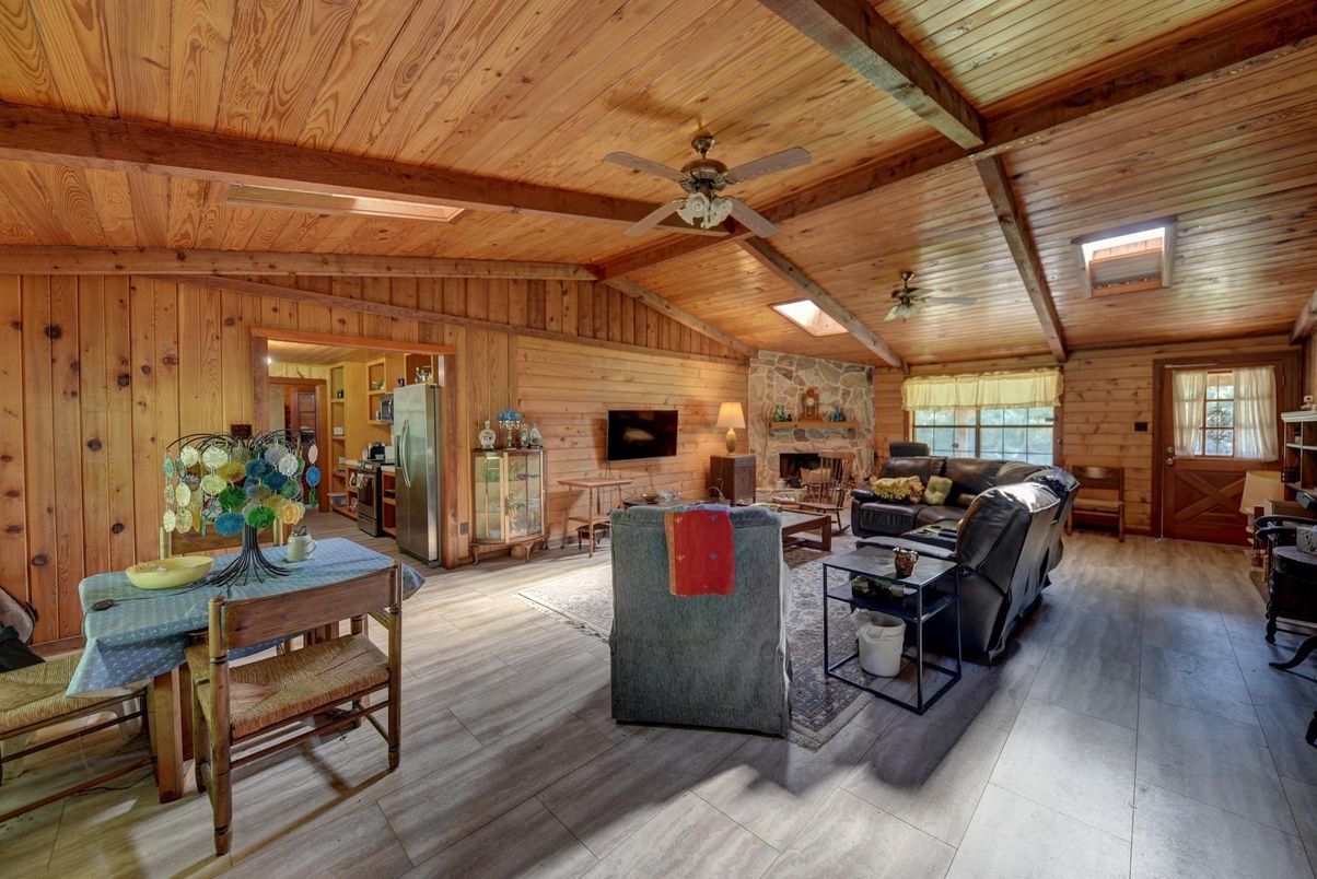 Dining room, Fireplace, Interior, Living room, Stone Walls, Wooden Beams, Wooden Ceilings, Wood Texture Flooring, Wooden Walls