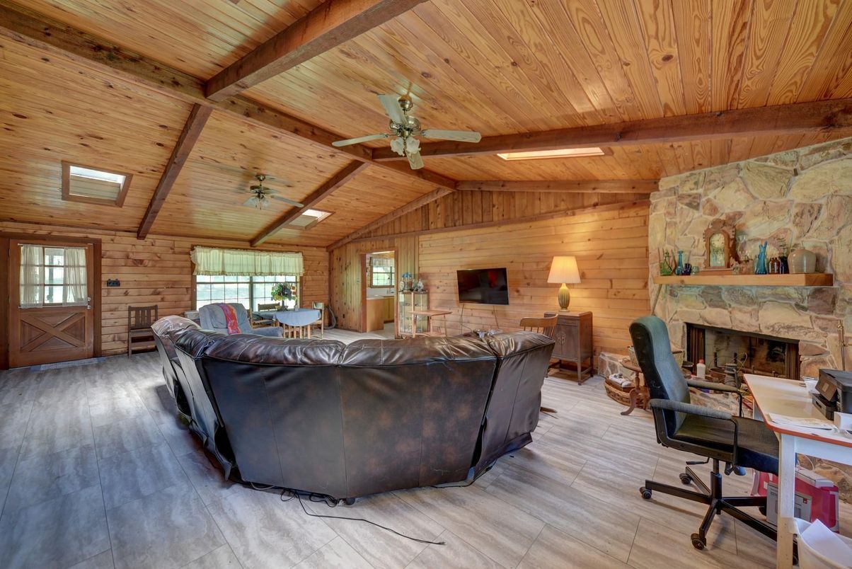 Fireplace, Home Office, Interior, Living room, Stone Walls, Wooden Beams, Wooden Ceilings, Wood Texture Flooring, Wooden Walls