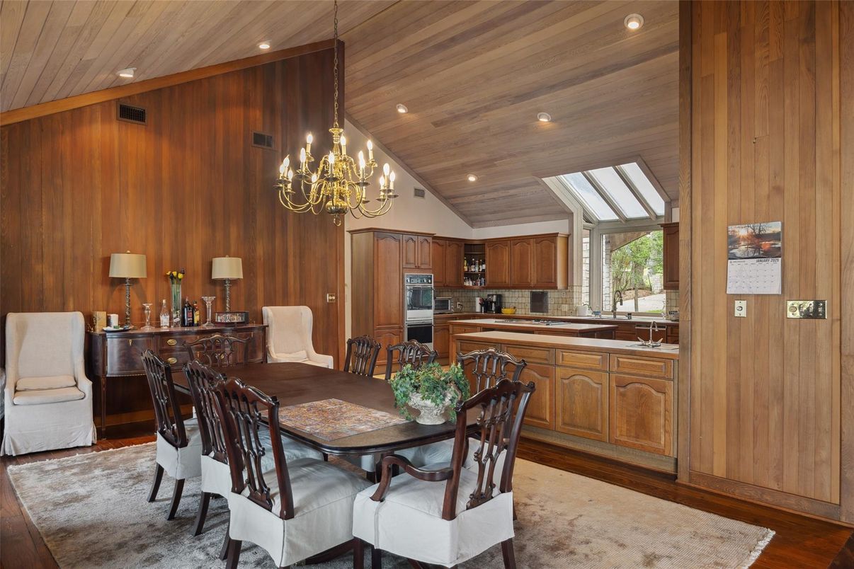 Chandelier, Dining room, Interior, Kitchen, Recessed Lighting, Stainless Steel Appliances, Wooden Ceilings, Wood Texture Flooring, Wooden Walls