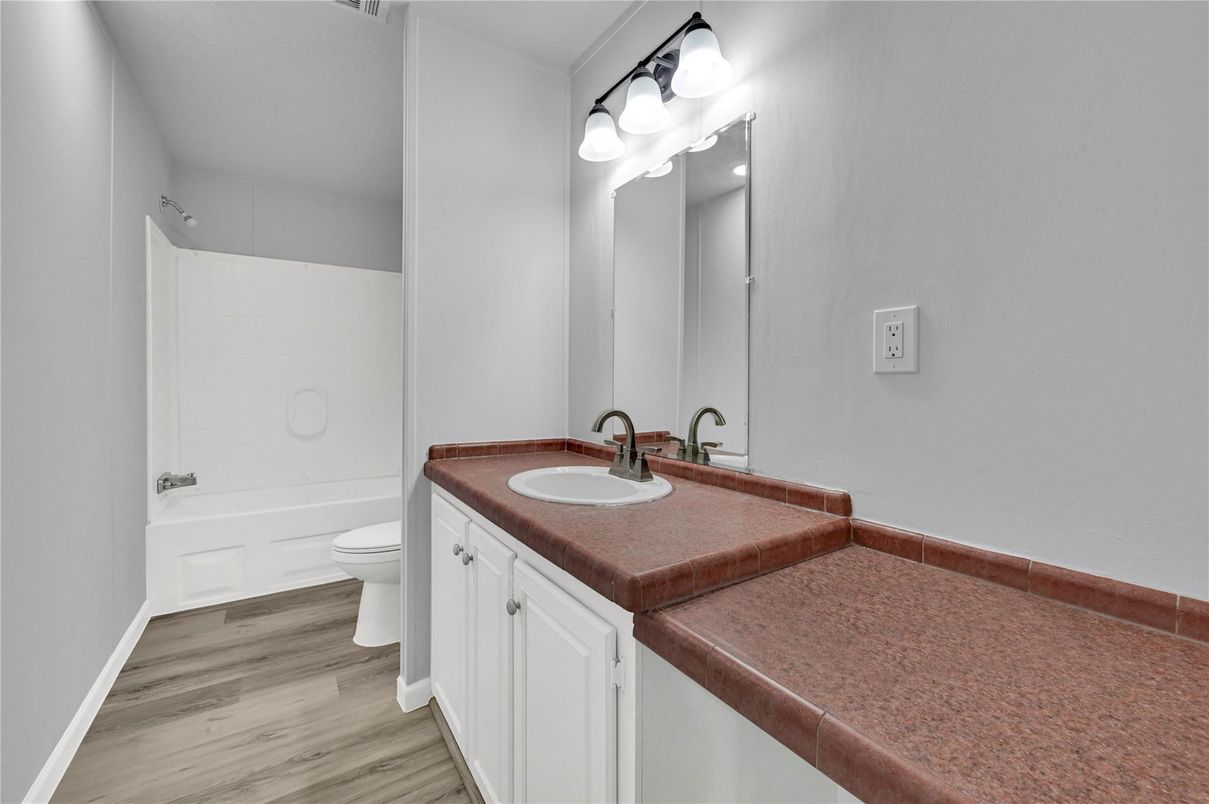 Bathroom, Dual Sink Vanities, Interior, Tile Countertops, Wood Texture Flooring
