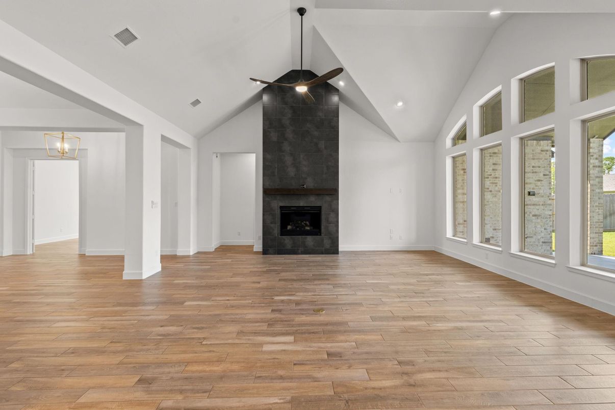 Empty room, Fireplace, Interior, Pendant Lights, Recessed Lighting, Wood Texture Flooring