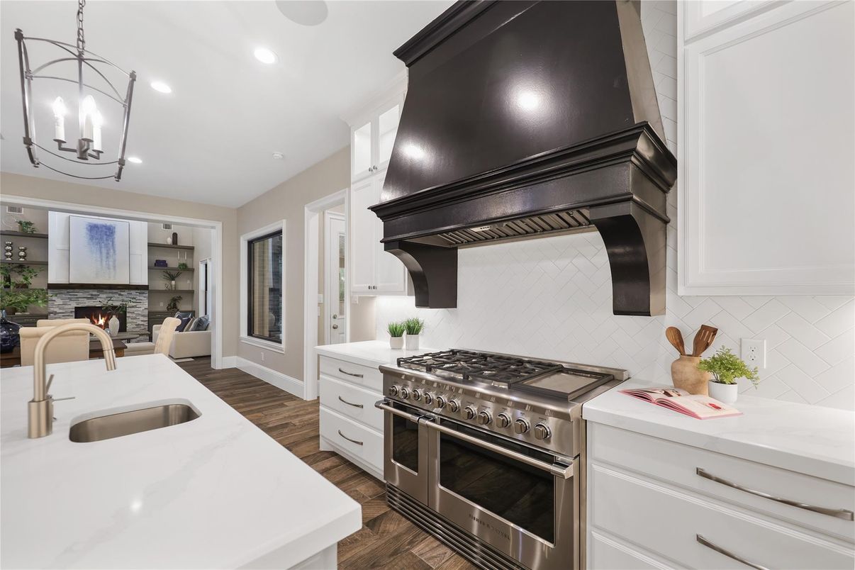 Fireplace, Interior, Kitchen, Pendant Lights, Recessed Lighting, Stainless Steel Appliances, Wood Texture Flooring