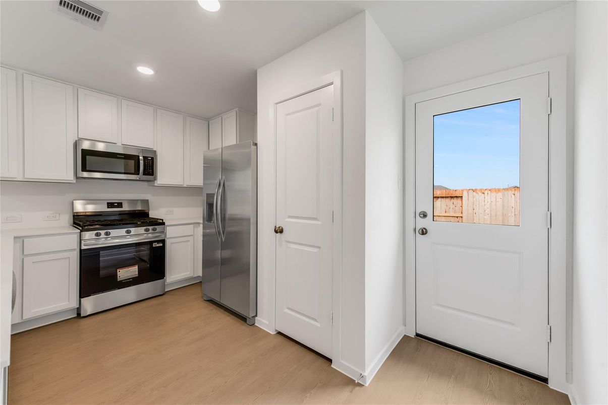 Interior, Kitchen, Recessed Lighting, Stainless Steel Appliances, Wood Texture Flooring