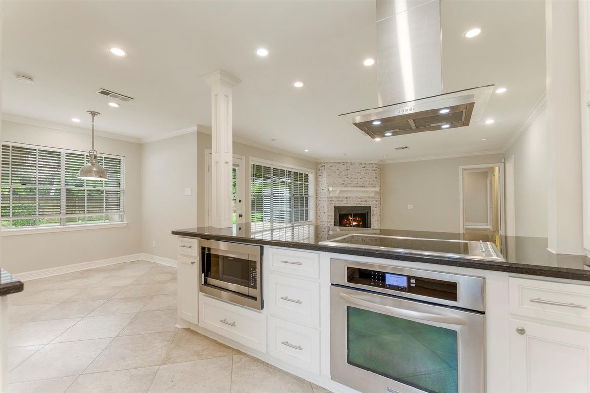 Fireplace, Interior, Kitchen, Pendant Lights, Recessed Lighting, Stainless Steel Appliances