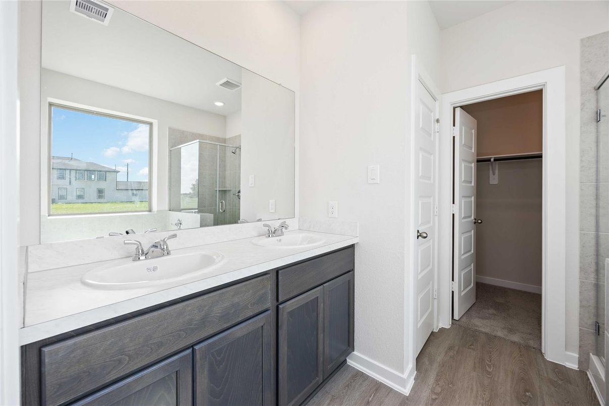 Bathroom, Dual Sink Vanities, Glass Shower, Interior, Recessed Lighting, Wood Texture Flooring